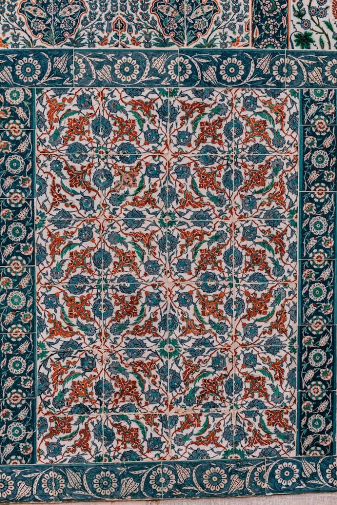 Detailed close-up of an Islamic tile mural in Istanbul showcasing traditional floral patterns.