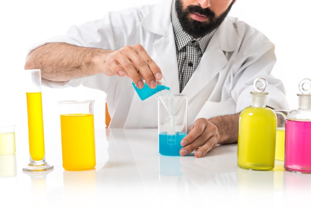 scientist man with test tubes