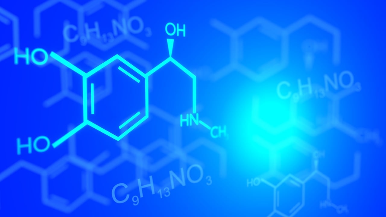 Illustration of non-ionic detergent molecules interacting with oil and water particles.