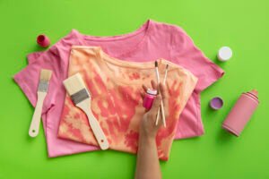 top view of hand painting t-shirt
